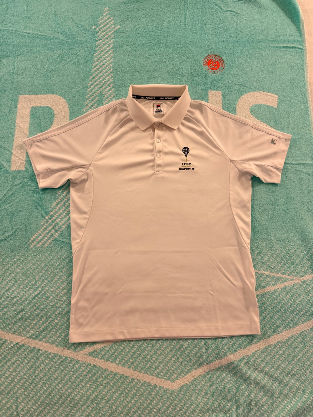 Fila Men’s Polo featuring the International Tennis Hall of Fame logo